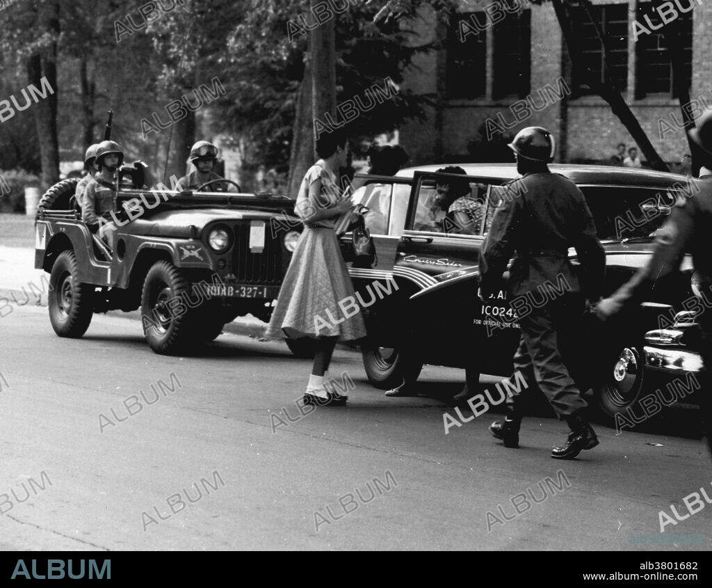 Operation Arkansas. Soldiers from the 101st Airborne Division escort the Little Rock Nine students into the all-white Central High School in Little Rock, Arkansas.