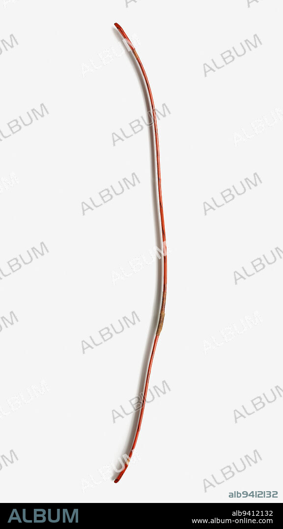 Longbow, 19th century, Unknown Japanese, 84 × 1 3/4 × 9 1/2 in. (213.36 × 4.45 × 24.13 cm), Laminated lacquered bamboo, Japan, 19th century, Although the sword is the iconic weapon of the samurai, mastery of the longbow was also a highly regarded skill, and expert archers were the stuff of legends. Longbows were the main weapon during the Heian (7841185) and Kamakura (11851333) periods and became formally accepted as a military weapon in 1252. During battle, samurai first shot arrows from horseback before they resorted to sword fighting. In the 1300s, long swords and spears became the weapons of choice for the main offensive, and guns were subsequently introduced in the early 1500s. Archery eventually evolved into a more formal and ceremonial tradition.