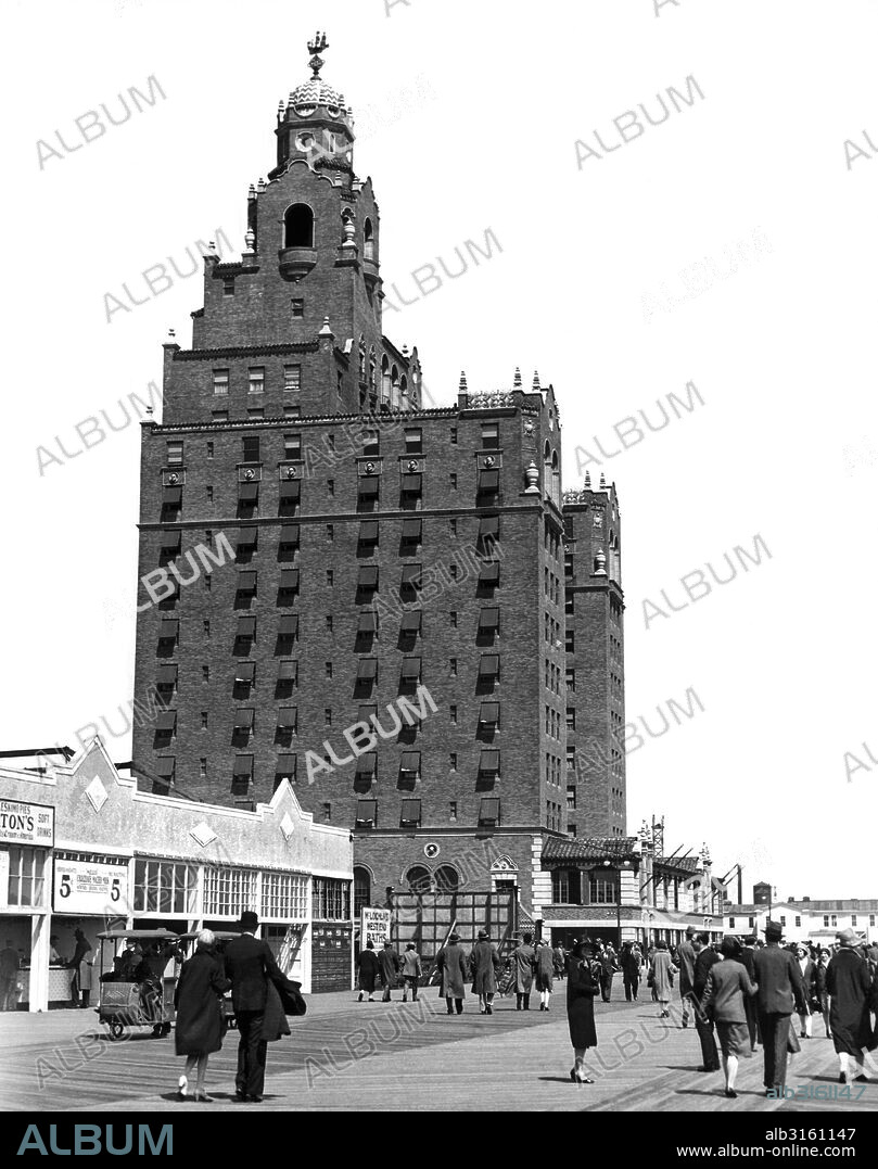 New York, New York May 2, 1927 People on the boardwalk in front of the new Half Moon Hotel at Coney Island in Brooklyn.