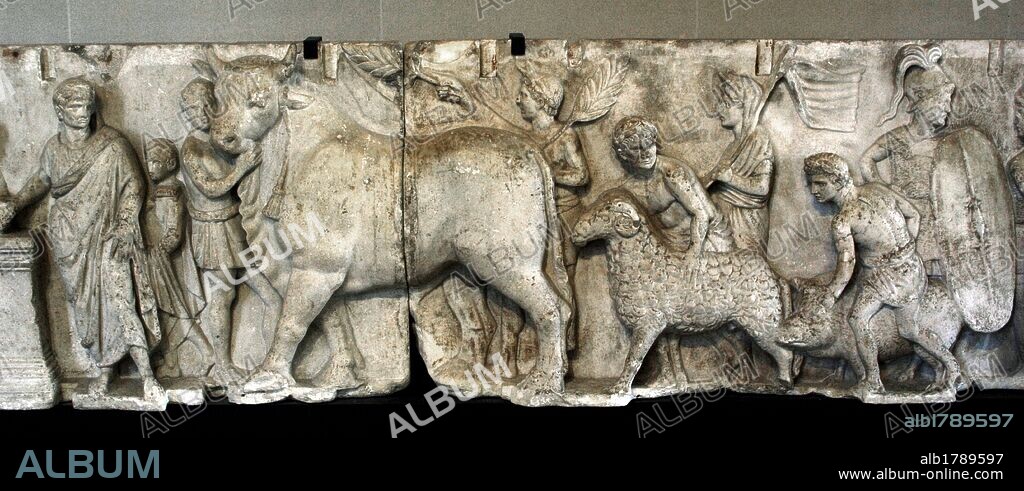 Roman Art. Italy. Frieze from the Altar of Domitius Ahenobarbus, Consul, (54 B.C.). Marble. Late 2nd century BC. Detail showing an animal sacrifice. Suovetaurilia: sacrifice of a pig, a ram and a bull. Domitius is dressed with toga and laurel wreath. It comes from Campo Marzio, Rome. Louvre Museum. Paris. France.