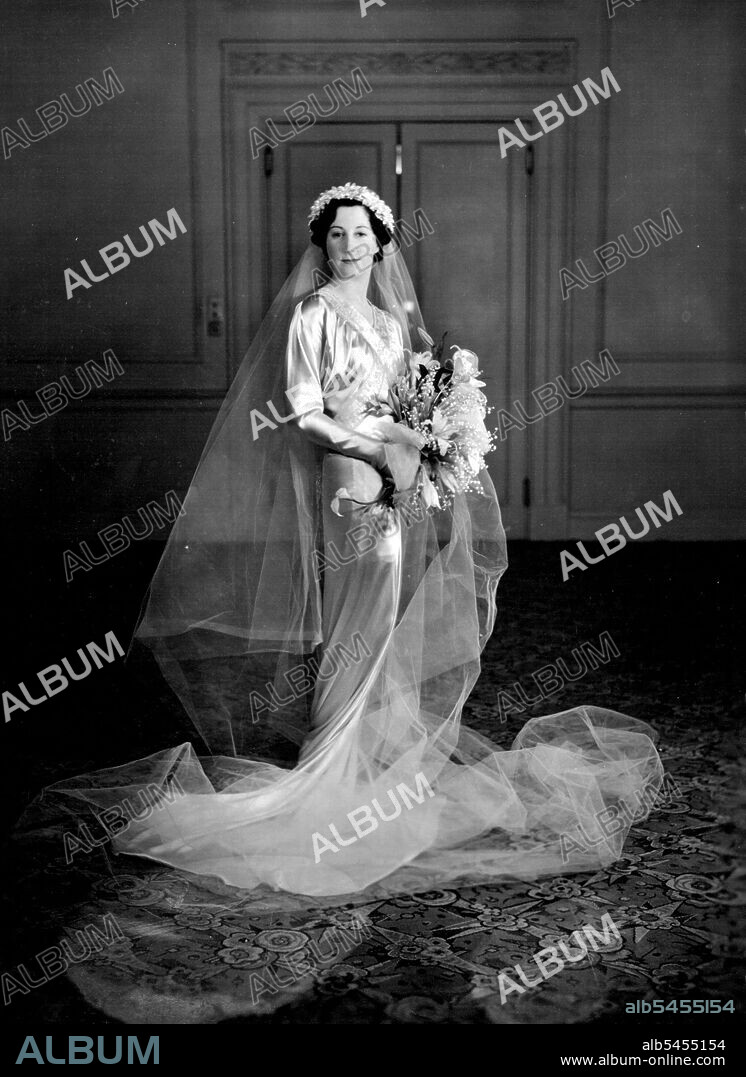 Interesting London Wedding Of Miss C. Ferris-Scott And Mr. Gregory Blaxland Kater: The marriage took place in London on Saturday April 3rd of:- Mr. Gregory Blaxland Kater, youngest son of the Hon. Sir Norman Kater, Kt. M.L.C., of Sydney, Australia, and :- Miss Catherine Ferris-Scott, only daughter of Mr. and Mrs. Ferris-Scott, of Wyhtegate, Riverside, Staines, at St. George's Hanover Square. April 20, 1937. (Photo by Bassano Ltd.).c.