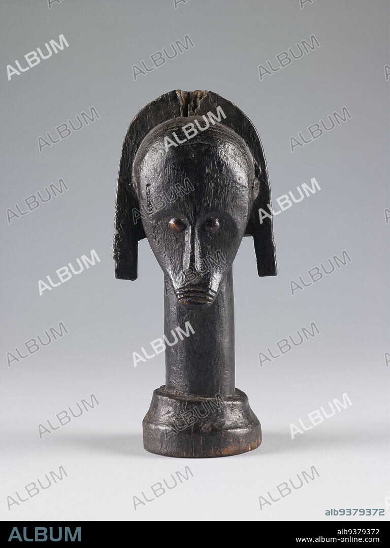 Reliquary Head (angokh nlo byeri), Unidentified Fang artist (Betsi subgroup), late 19th century, Wood with brass studs, Woleu-Ntem province, Central Africa, Gabon, Africa, Río Muni region, Central Africa, Equatorial Guinea, Africa, Sculpture, 11 3/4 in. x 5 in. x 4 3/8 in. (29.8 x 12.7 x 11.1 cm).