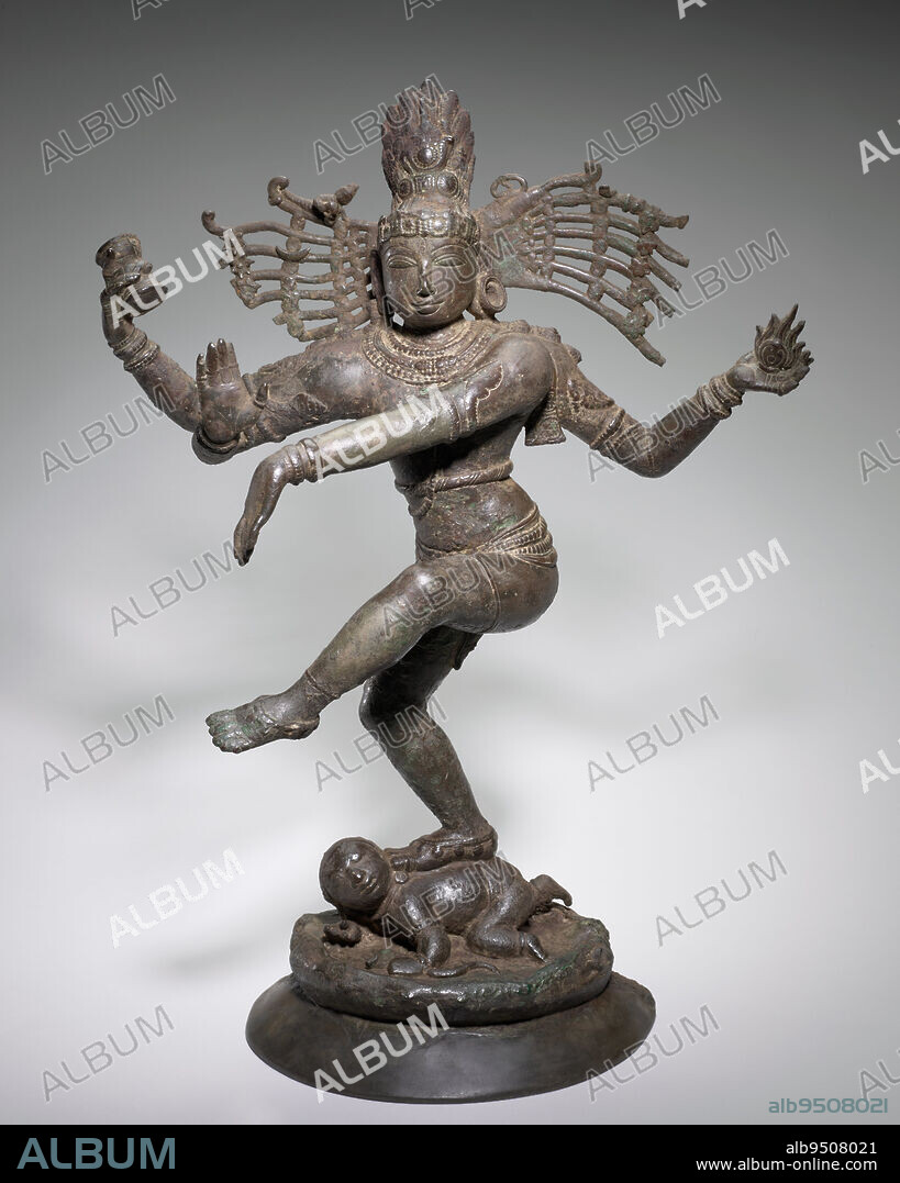 Shiva Nataraja (Lord of the Dance), c. 1100, 28 in. (71.12 cm), Bronze, India, 11th or 12th century, The Hindu god Shiva appears in several incarnations. Here, Shiva appears as Nataraja, or Lord of the Dance. He raises his left foot in a graceful dance pose. In his upper right hand, Nataraja holds a drum, the sound of which manifests creation. The flame that he holds in his upper left hand symbolizes destruction. Together, they symbolize the creation and destruction of the cosmic universe. The posture of the icons lower left and right palms signifies protection. The foot that rests on the demons back symbolizes the elimination of ignorance, while the raised left foot signifies salvation. A now missing ring of fire, symbolic of the simultaneous and continuous creation and destruction of the universe, would have encircled the bronze icon.