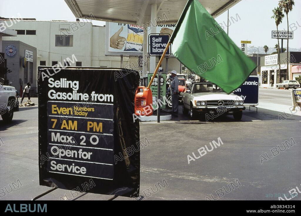 Editorial use only . Gas rationing at a Los Angeles gas station, during the gas shortage of 1979. Green flag indicates that gas is available, for even-numbered license plates on this day.