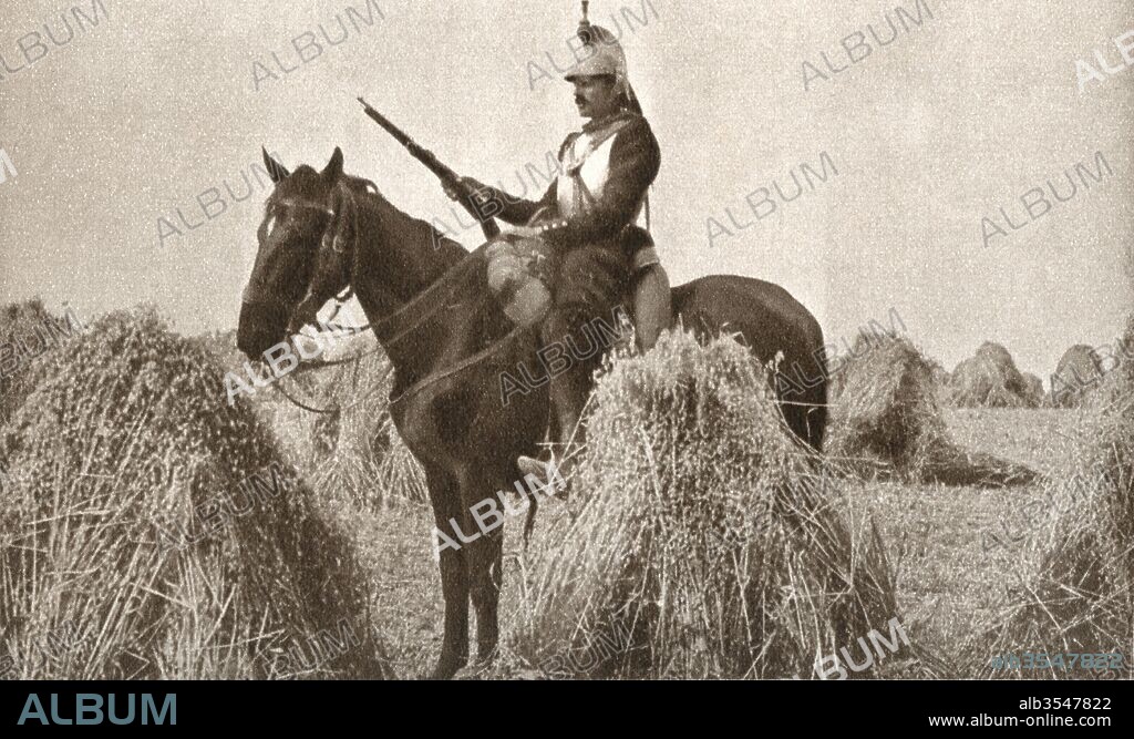 A French cuirassier on sentry duty at the start of WWI in 1914. Soon after the use of both helmet and breast plate was abolished. From The Pageant of the Century, published 1934.