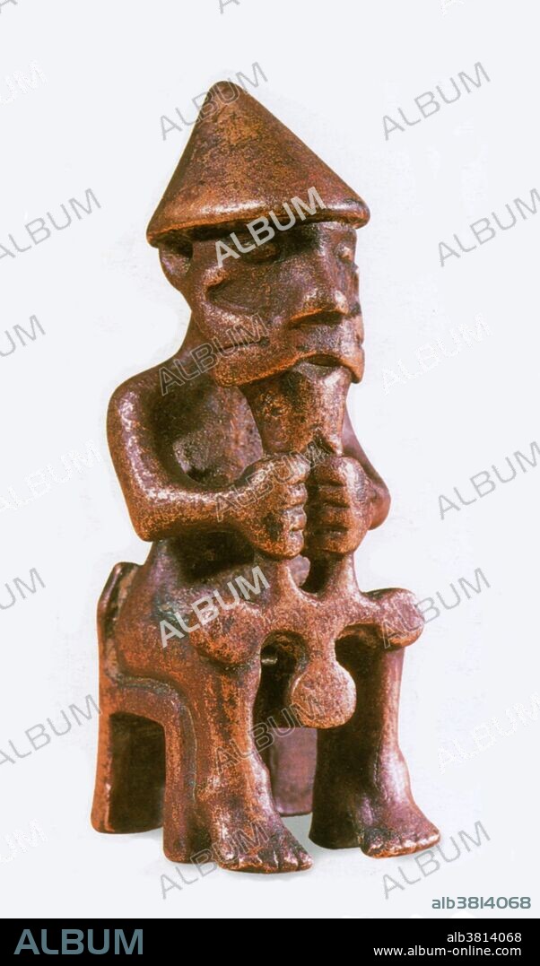 Thor, Norse god of thunder, holding his hammer.
