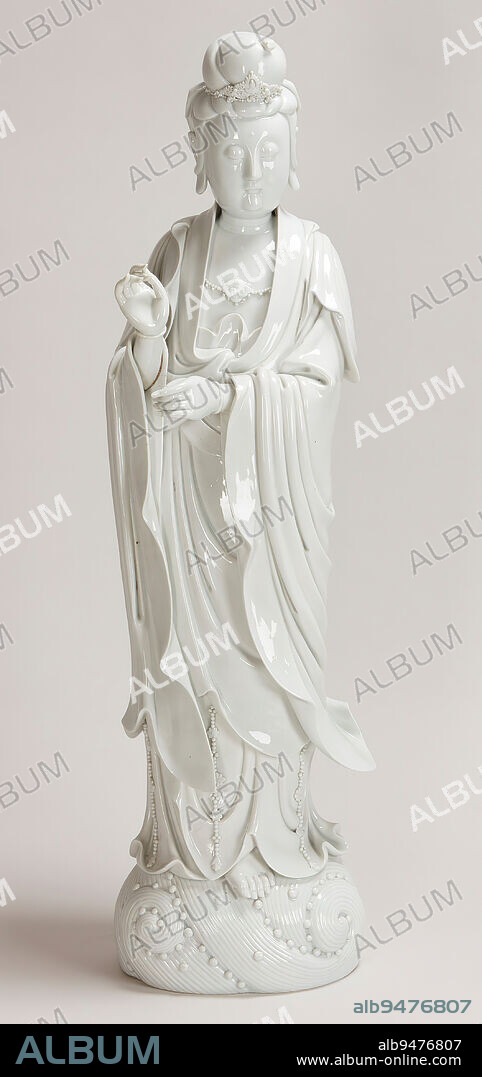 Blanc de Chine Figure of Kuan Yin, Goddess of Mercy and Hearer of All Prayers, Standing Upon Crested Seawaves, c. 1800, 33 3/4 x 8 5/8 x 10in. (85.7 x 21.9 x 25.4cm), Porcelain, China, 18th-19th century.
