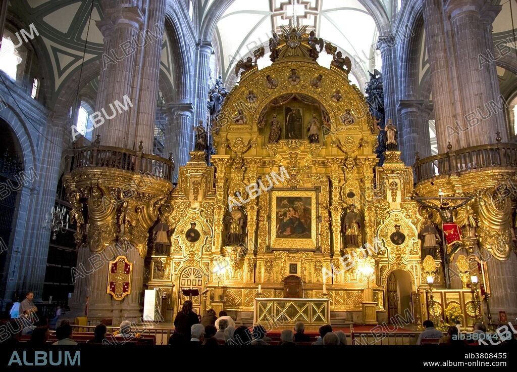 A gold alter inside the Catedral Metropolitana located on Mexico City's central square, the zocalo, Mexico.