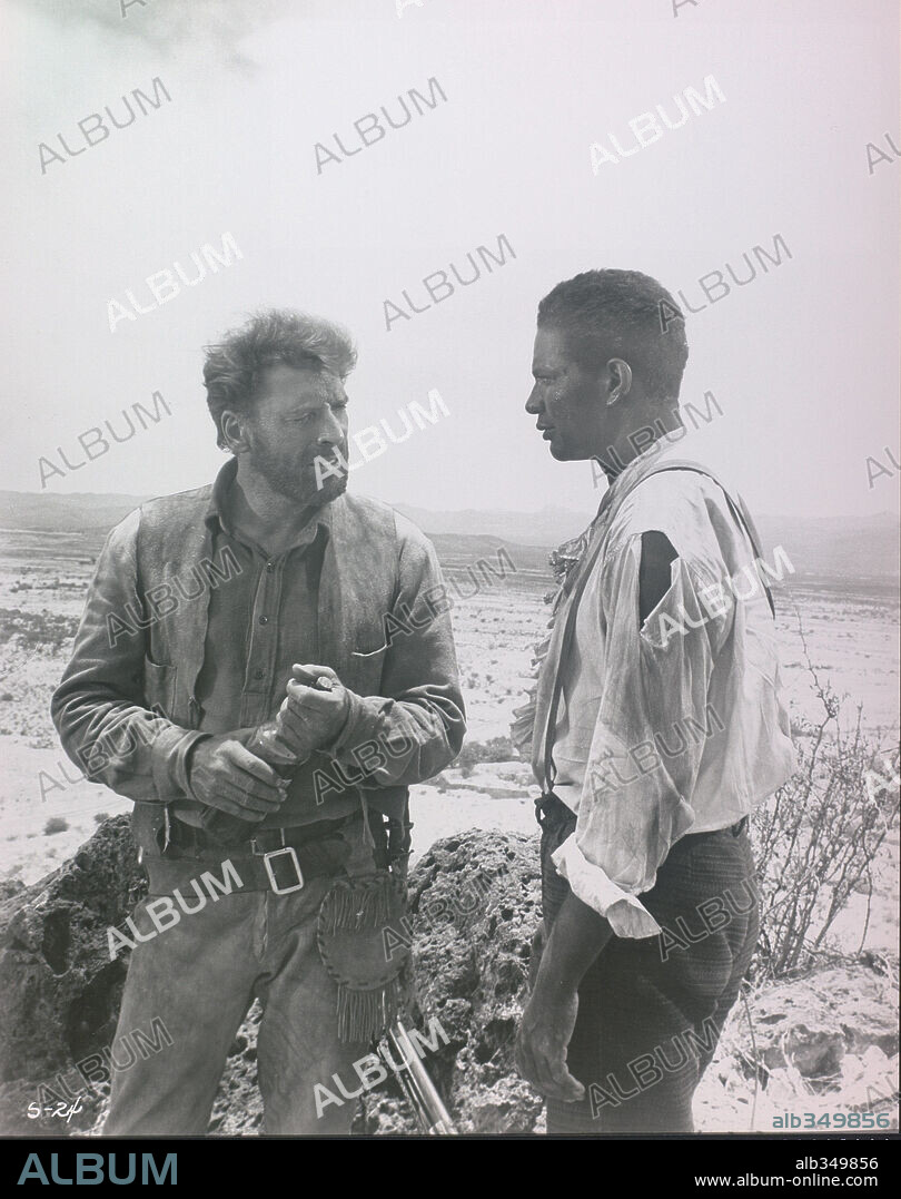 BURT LANCASTER and OSSIE DAVIS in THE SCALPHUNTERS, 1968, directed by SYDNEY POLLACK. Copyright UNITED ARTISTS.