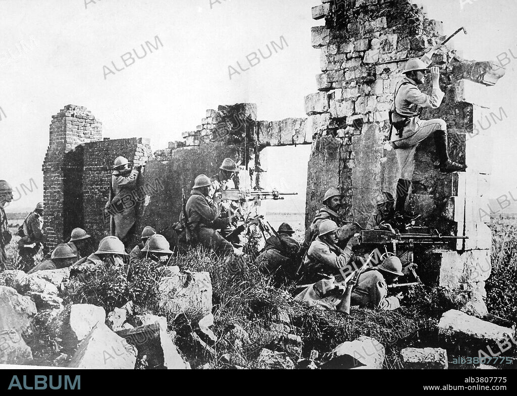 French troopers under General Gouraud, with their machine guns amongst the ruins of a cathedral near the Marne, driving back the Germans. The Second Battle of the Marne (July 15 - August 6, 1918) was the last major German Spring Offensive on the Western Front during the First World War. The German attack failed when an Allied counterattack led by French forces and including several hundred tanks overwhelmed the Germans on their right flank, inflicting severe casualties. The German defeat marked the start of the relentless Allied advance which culminated in the Armistice about 100 days later. The Second Battle of the Marne can be considered as the beginning of the end of the Great War. Henri Joseph EugÃ¨ne Gouraud (November 17, 1867- September 16, 1946) was a French general, best known for his leadership of the French Fourth Army at the end of the World War I. Photo taken by Central News Photo Service, 1918.
