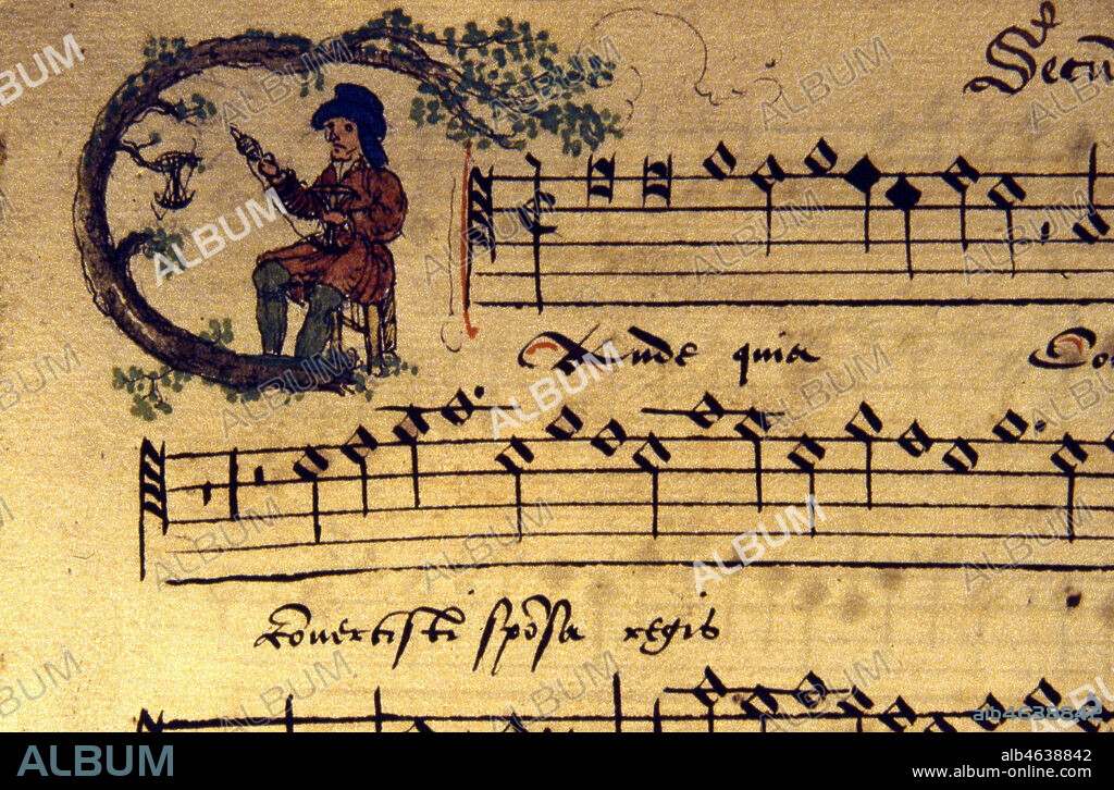 Lettre ornee G. Un homme file la laine. Enluminure tiree d'un recueil de chansons datant de 1542 (16e, 16eme, XVIe s.). Manuscrit conserve a la bibliotheque municipale de Cambrai. Ms 128. Credit : Collection JEAN VIGNE / KHARBINE-TAPABOR.