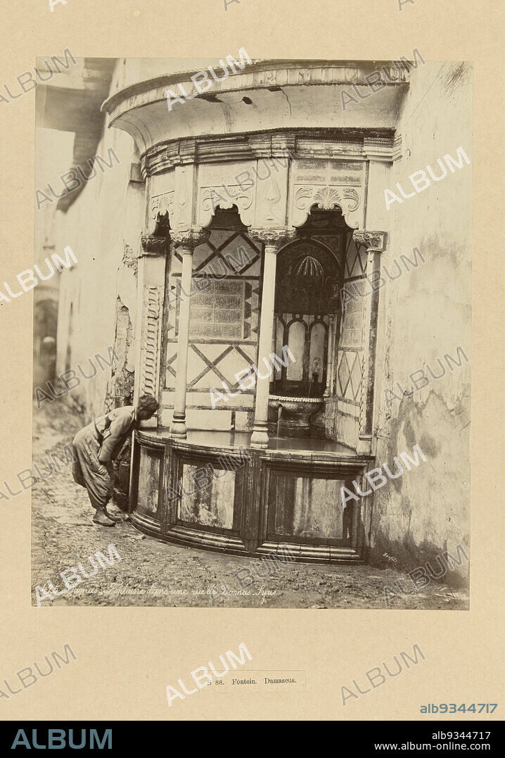 S 88. Damascus Fountain. (title on object), Syria (series title)425. Damas. Fontaine dans une rue de Damas-Syrie, Bonfils. (title on object), A man drinks from a covered city fountain. The photograph is part of Richard Polak's collected photo series of Syria., Bonfils, Damascus, c. 1867 - c. 1876, photographic support, paper, albumen print, height 274 mm × width 220 mmheight 442 mm × width 556 mm.