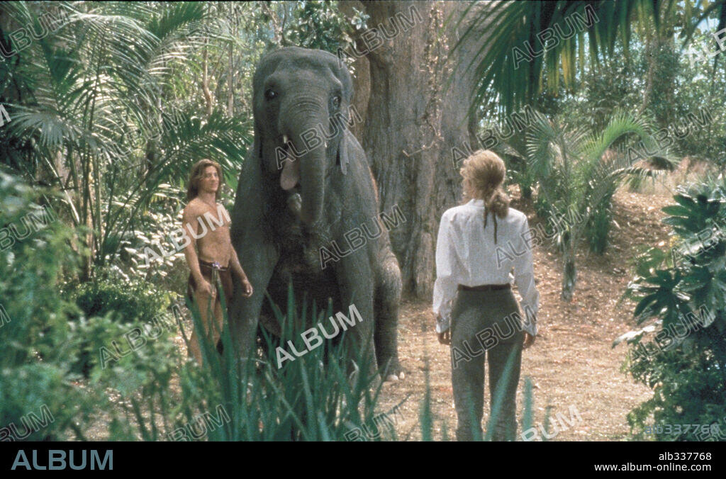 BRENDAN FRASER and LESLIE MANN in GEORGE OF THE JUNGLE, 1997, directed by SAM WEISMAN. Copyright DISNEY / BLACKBURN, MARSHA.