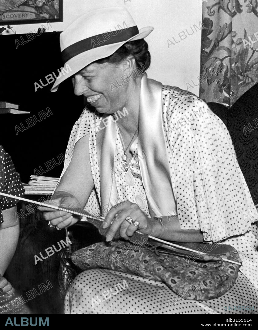 Washington, D.C.:  June 2, 1936. Eleanor Roosevelt tried her hand at knitting at the Associated Country Women Of The World's exhibit at their triennial convention.
