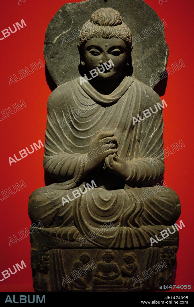 Estatua de Buda sentado con las manos en posición de dharmachakra mudra. Gandara. S. II-III (S. II-S. III). Museo de Pérgamo. Berlín. Alemania.