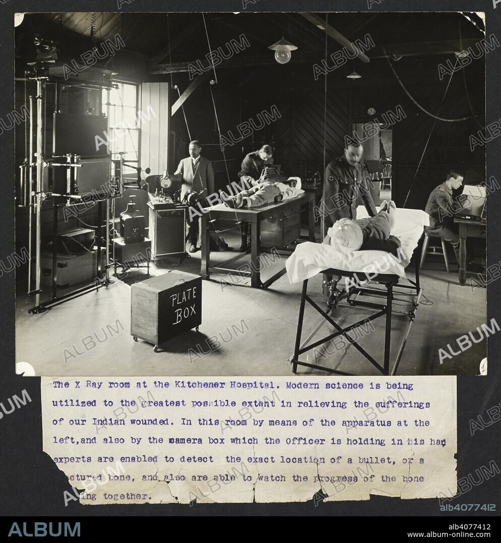 H. D GIRDWOOD. The X-ray room at the Kitchener Hospital [Brighton, England]. The room in operation, with patients being examined. 'Modern science is being utilized to the greatest possible extent in relieving the sufferings of our Indian wounded. In this room by means of the apparatus at the left, and also by means of the camera box which the officer is holding in his hands, experts are enabled to detect the exact location of a bullet, or a fractured bone, and are also able to watch the progress of the bone [join]ing together'. Record of the Indian Army in Europe during the First World War. 20th century, 1915. Gelatin silver prints. Source: Photo 24/(10). Language: English.