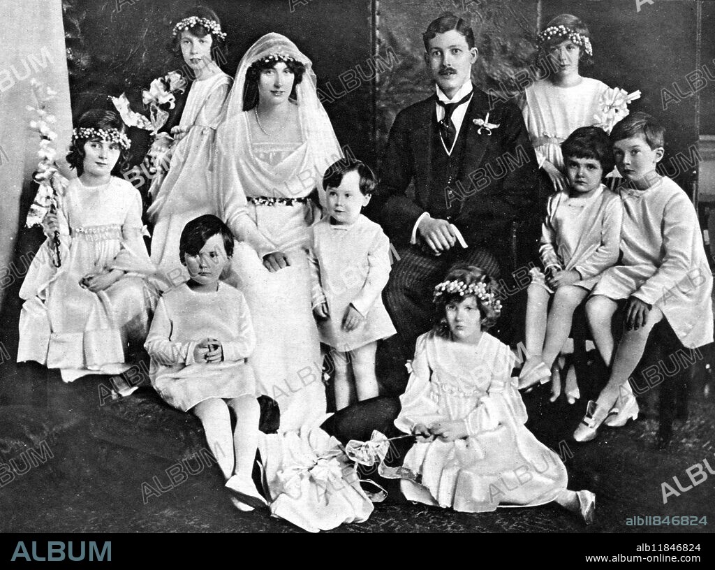 The marriage of Lady Dorothy Cavendish and Mr Harold Macmillan, late of the Grenadier Guards: The bride and bridegroom, with the bridesmaids and pages. In the lower group the figures in the back row are (LtoR) Lady Katherine Fitzmaurice (daughter of the Earl of Kerry); Lady Anne Cavendish (the bride's sister); the bride; the bridegroom; Miss Diana Cavendish (the bride's cousin); the Hon Peter Cecil; and Master George Mercer-Nairne. In front, on the right, is Miss Sybil Cavendish. The other two little boys are the Earl of Burlington (the bride's nephew) and the Hon Charles Fitzmaurice. 1 May 1920.