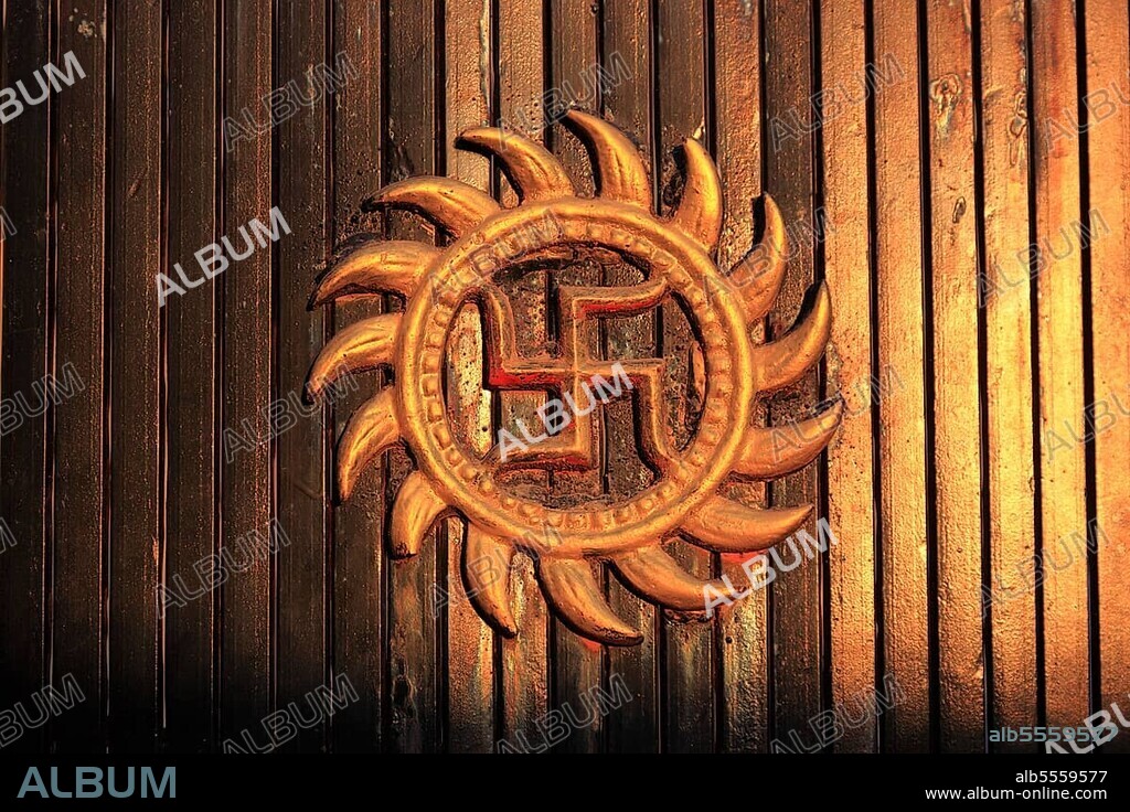 India, the sun wheel, a swastika, lucky charm, is a cross symbol with bent or curved arms, sun sign of the sun deity, North India, India