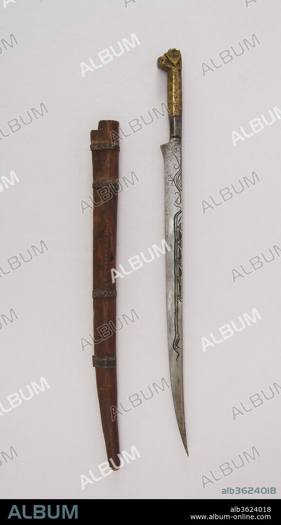 Knife (Flyssa) with sheath. Culture: Moroccan. Dimensions: H. with sheath 18 1/16 in. (45.9 cm); H. without sheath 17 in. (43.2 cm); H. of blade 13 1/4 in. (33.7 cm); W. 1 in. (2.5 cm); Wt. 6.5 oz. (184.3 g); Wt. of sheath 2.1 oz. (59.5 g). Date: 19th century.