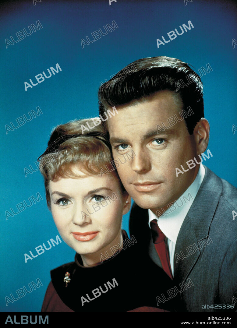 DEBBIE REYNOLDS and ROBERT WAGNER in SAY ONE FOR ME, 1959, directed by FRANK TASHLIN. Copyright 20TH CENTURY FOX.