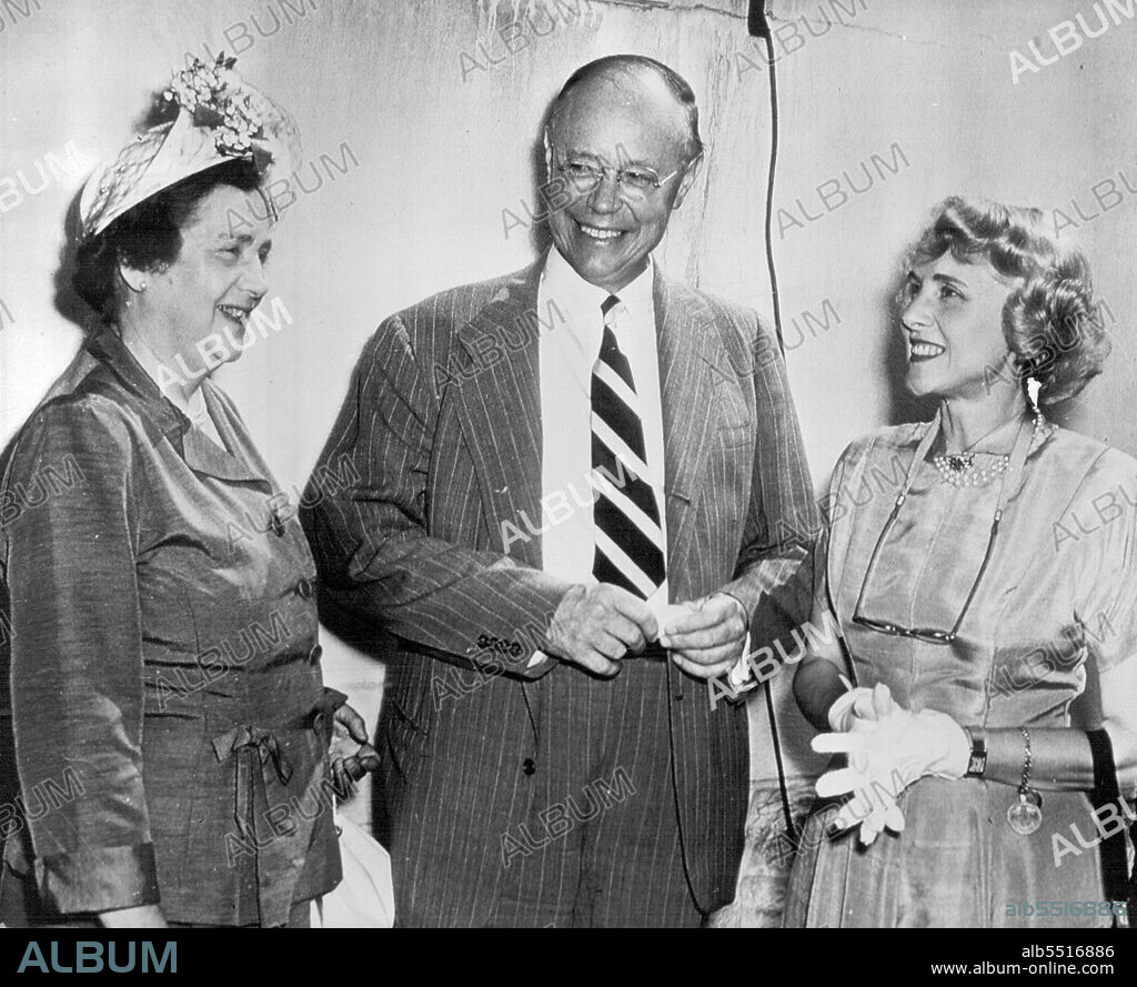 Informal Moment at G.O.P. Gathering -- Sen. Robert A. Taft and Mrs. Taft chat with Mrs. Clare Booth Luce (right), former Connecticut Representative, yesterday at suburban Valley Forge estate of Martin Clement, president of the Pennsylvania Railroad. Leading Republican personalities met in pre-convention gathering at Clement's home. Meeting was described as "Purely social." June 21, 1948. (Photo by AP Wirephoto).