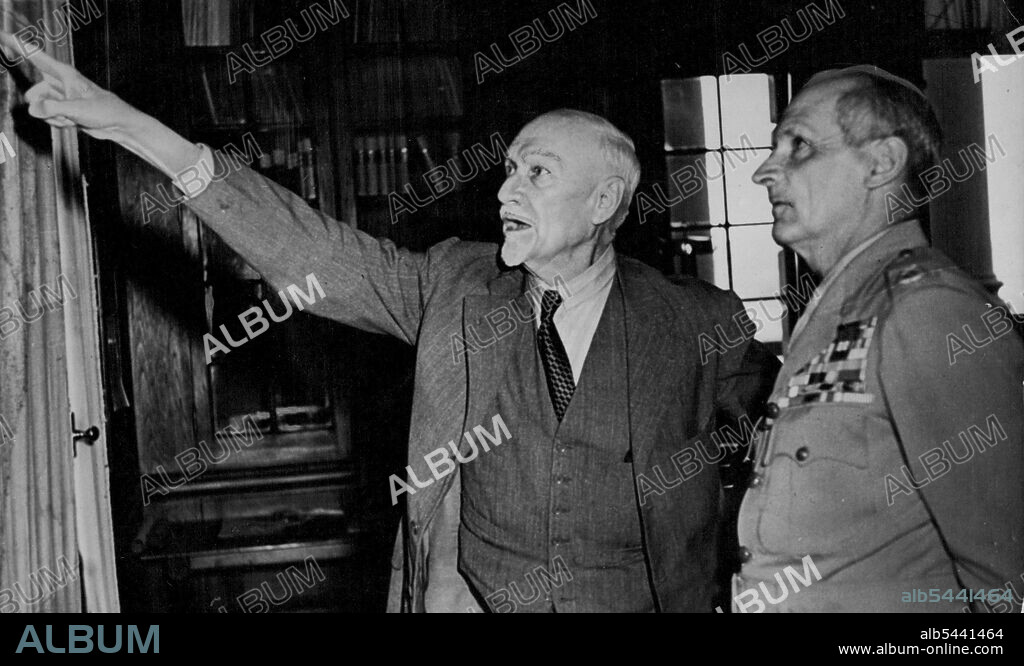 Gen. Smuts Explains To "Monty" -- Field-Mrshal Jan Christian Smuts, O.M., C.H., K.C. (left), Prime Minister of South Africa, points to the map of Africa in his office at Pretoria, during a conference with Field-Marshal viscount Montgomery of Alamein, Chief of the imperia General Staff, when they discussed South Africa's position in Commonwealth strategy, December 6. South Africa's GOM, the late Field Marshal Jan Smuts, shows fellow British Field Marshal Montgomery key positions on a map of South Africa, during a conference in Pretoria. November 17, 1953.