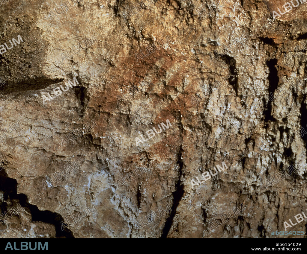 PINTURA RUPESTRE DE MANO SIN DEDO MEÑIQUE EN LA CUEVA DE MATRAVIESO.
