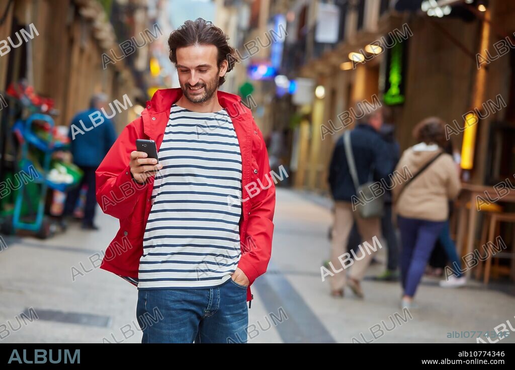 Young man, Parte Vieja, Old town, Donostia, San Sebastian, Gipuzkoa, Basque Country, Spain, Europe.