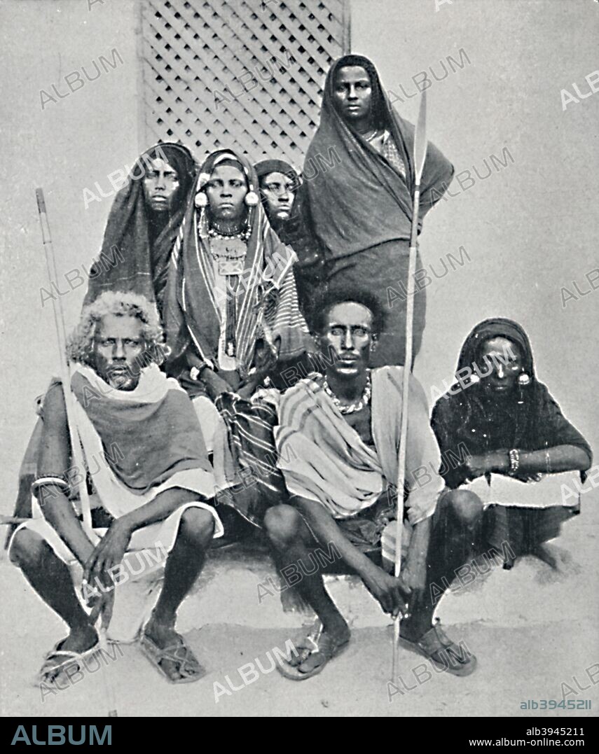 Group of Danakil men and women from the Italian port, Assab Bay, Eritrea, 1912. From The Living Races of Mankind, Vol. II. [Hutchinson & Co, London, 1912].