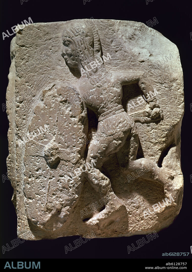 Warrior from Osuna. Relief made of limestone. Iberian art. 3th century B.C.. Madrid, National Museum of Archeology.
