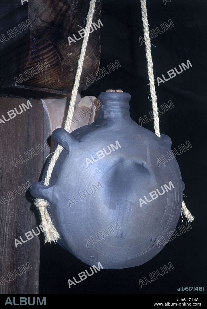 BOTIJO DE CARRO EN BARRO NEGRO-CERAMICA POPULAR.