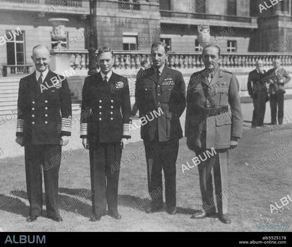 H.M. The King With His Chiefs of Staff: L to R. - Admiral of the Fleet Sir Andrew Cunningham, H.M. The King, Marshall of Royal Air Force, Sir Charles Portaln and Field Marshall Sir Alan Brooke, Chief of the Imperial Staff, on the Terrace at Buckingham Palace. August 15, 1945. (Photo by Fox).