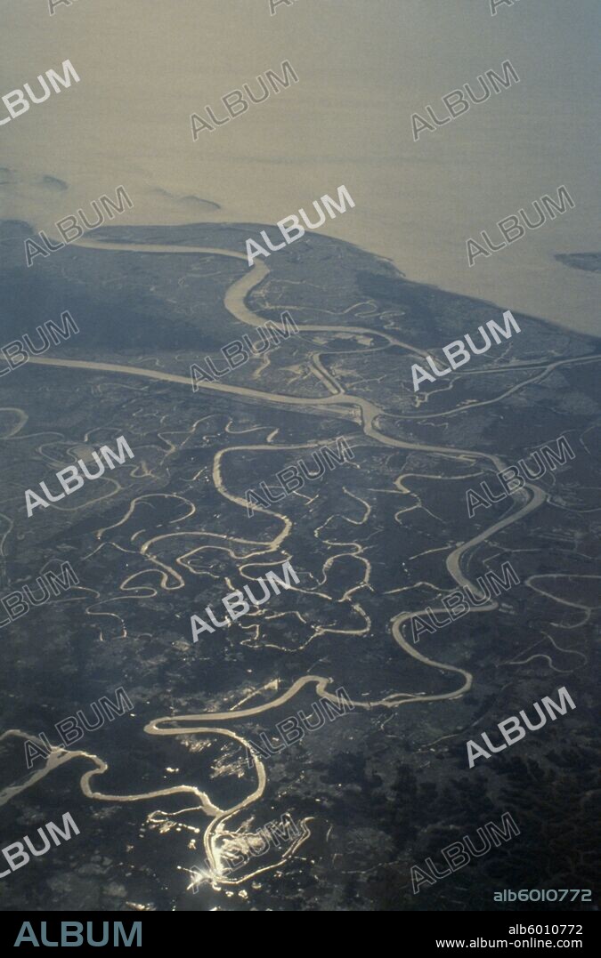 BANGLADESH Ganges Delta Aerial view over meandering river and tributaries.