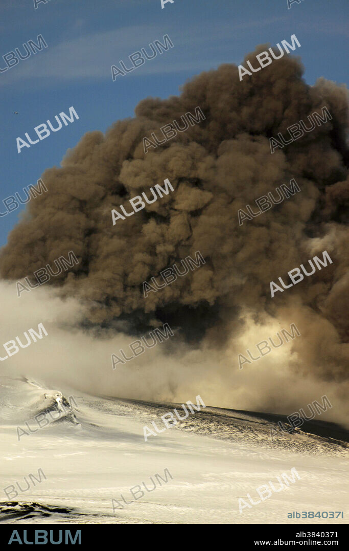 Ash cloud from Iceland's Eyjafjallajokull volcano. In March of 2010, the volcano erupted for the first time in 200 years. The resulting ash cloud caused the largest air-traffic shutdown in Europe since World War II. Iceland is the largest volcanic island on Earth and is sliced down the middle by the hot, geologically active Mid-Atlantic Ridge. This unique placement marks the boundary of the American Tectonic Plate and the Eurasian Tectonic Plate. As these plates spread, lava reaches Earth's surface, and Iceland's volcanoes are born.