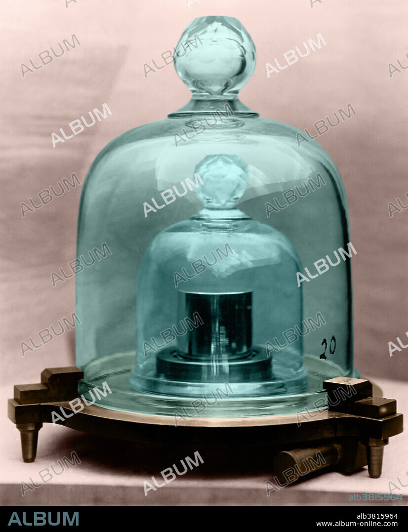 This platinum-iridium cylinder at the National Bureau of Standards is the primary standard kilogram for all metric measurements of mass in this country. It was furnished to the US by the International Bureau of Weights and Measures in accordance with the metric treaty of 1875. Recomparison with the international standard in 1937 showed that the US standard had changed by only one part in 50 million during approximately 50 years. Known as Kilogram No. 20, it is 39mm in diameter and 39mm high, and is made of an alloy containing 90% platinum and 10% iridium.