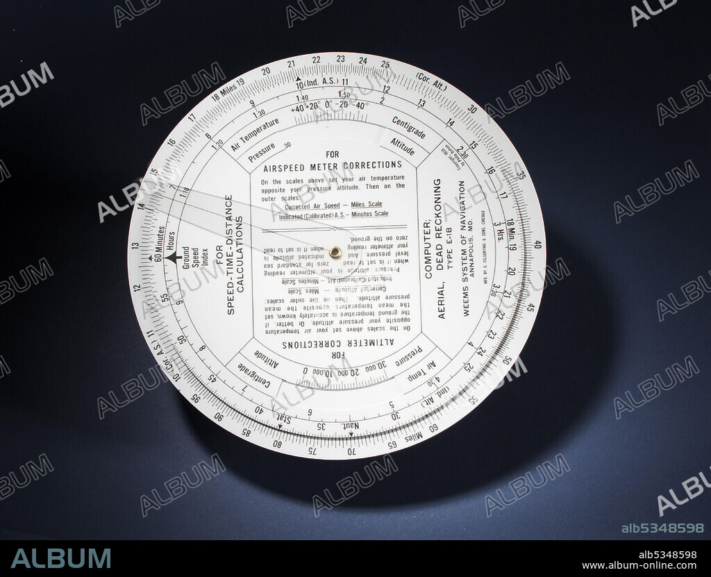 WEEMS SYSTEM OF NAVIGATION. White plastic dead reckoning computer used for aerial navigation. The circular computer has three discs for ground speed, mileage and course.