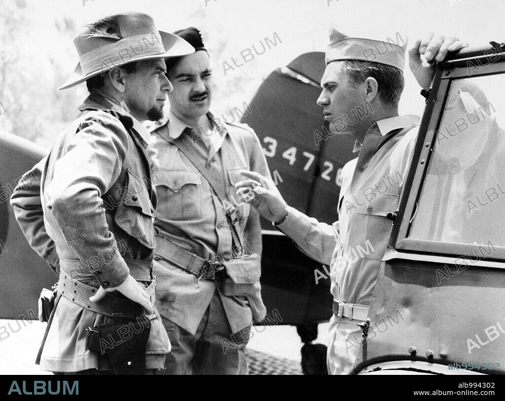 FRANK SINATRA and STEVE MCQUEEN in NEVER SO FEW, 1959, directed by JOHN STURGES. Copyright M.G.M.