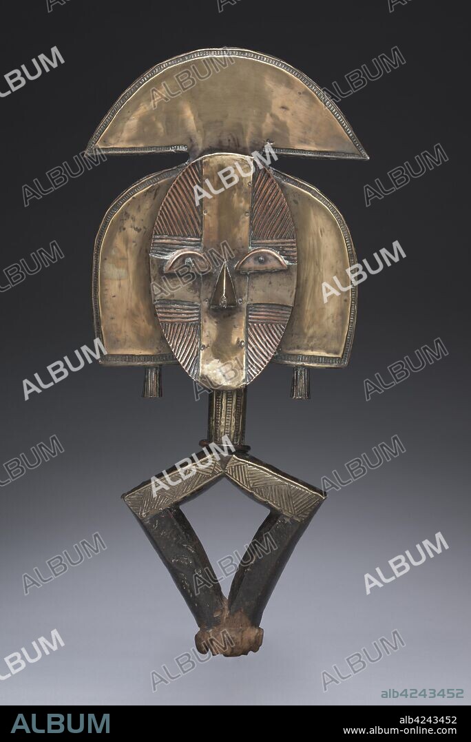 Reliquary Guardian Figure, probably 1800s. Equatorial Africa, Gabon, Kota, probably 19th century. Wood, metal; overall: 61 x 27.5 x 3 cm (24 x 10 13/16 x 1 3/16 in.).