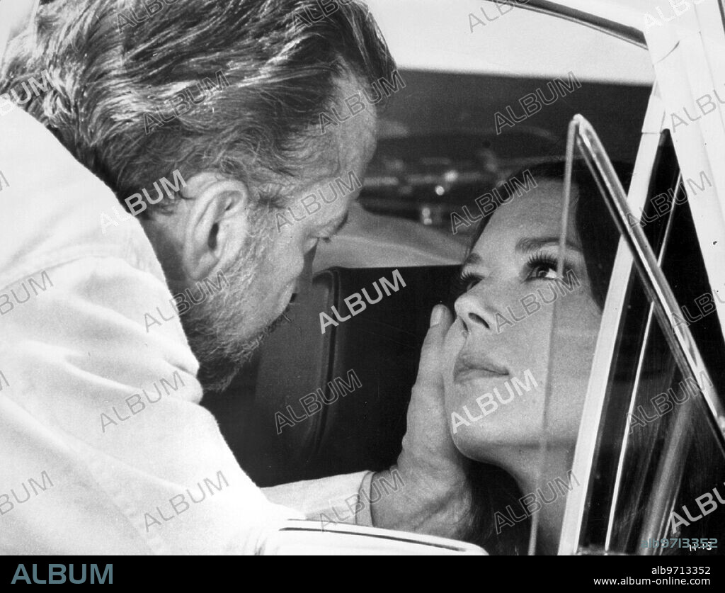 DIANA RIGG and GEORGE C. SCOTT in THE HOSPITAL, 1971, directed by ARTHUR HILLER. Copyright UNITED ARTISTS.