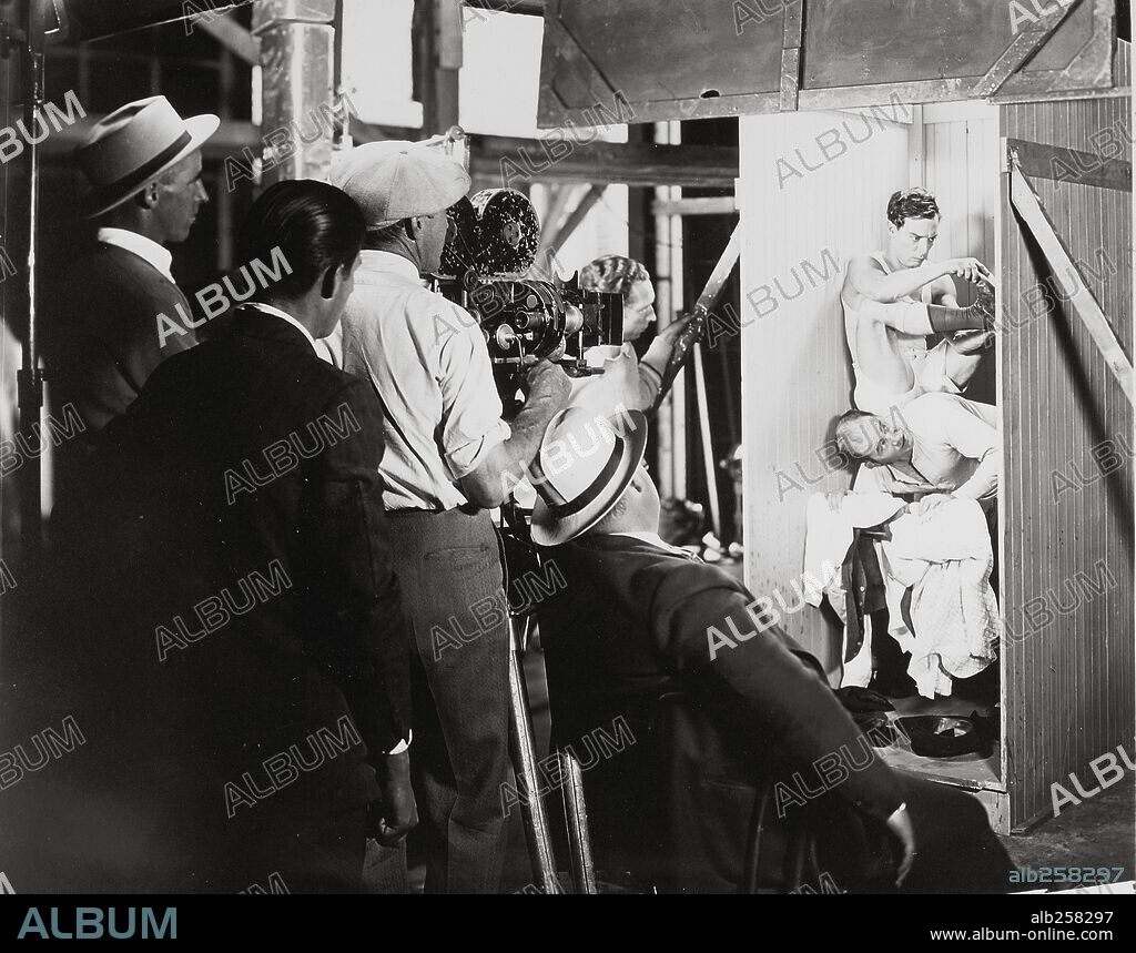 BUSTER KEATON and EDWARD S. BROPHY in THE CAMERAMAN, 1928, directed by EDWARD SEDGWICK. Copyright M.G.M.