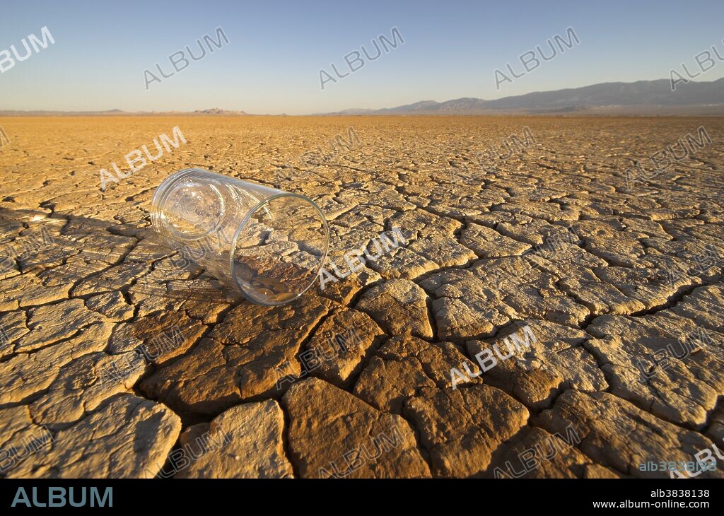 Water spilled on a dry lake bed; Mojave Desert, California.