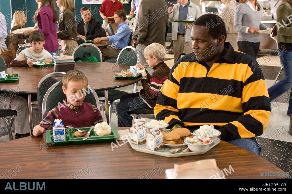 JAE HEAD y QUINTON AARON en BLIND SIDE, THE [UN SUEÑO POSIBLE], 2009 (THE BLIND SIDE), dirigida por JOHN LEE HANCOCK. Copyright ALCON ENTERTAIMENT / NELSON, RALPH.