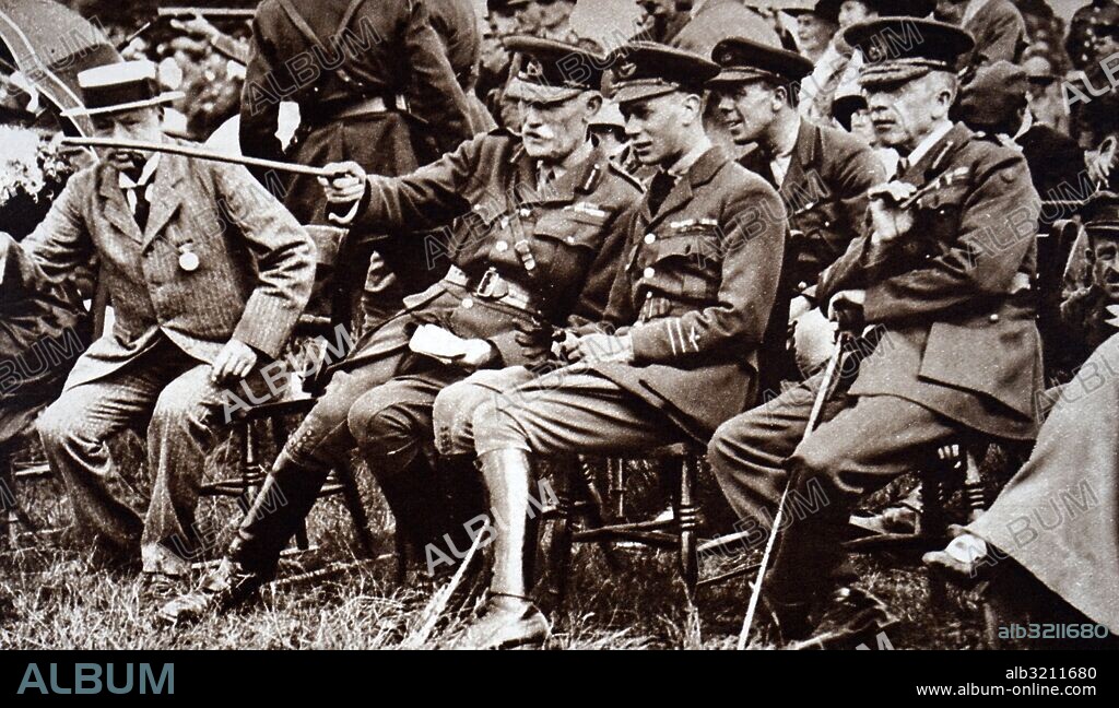 Photograph of Herbert Eaton, 3rd Baron Cheylesmore (1848-1925) pointing out features of the ranges, at the National Rifle Association meeting held at Bisley. Dated 20th Century.