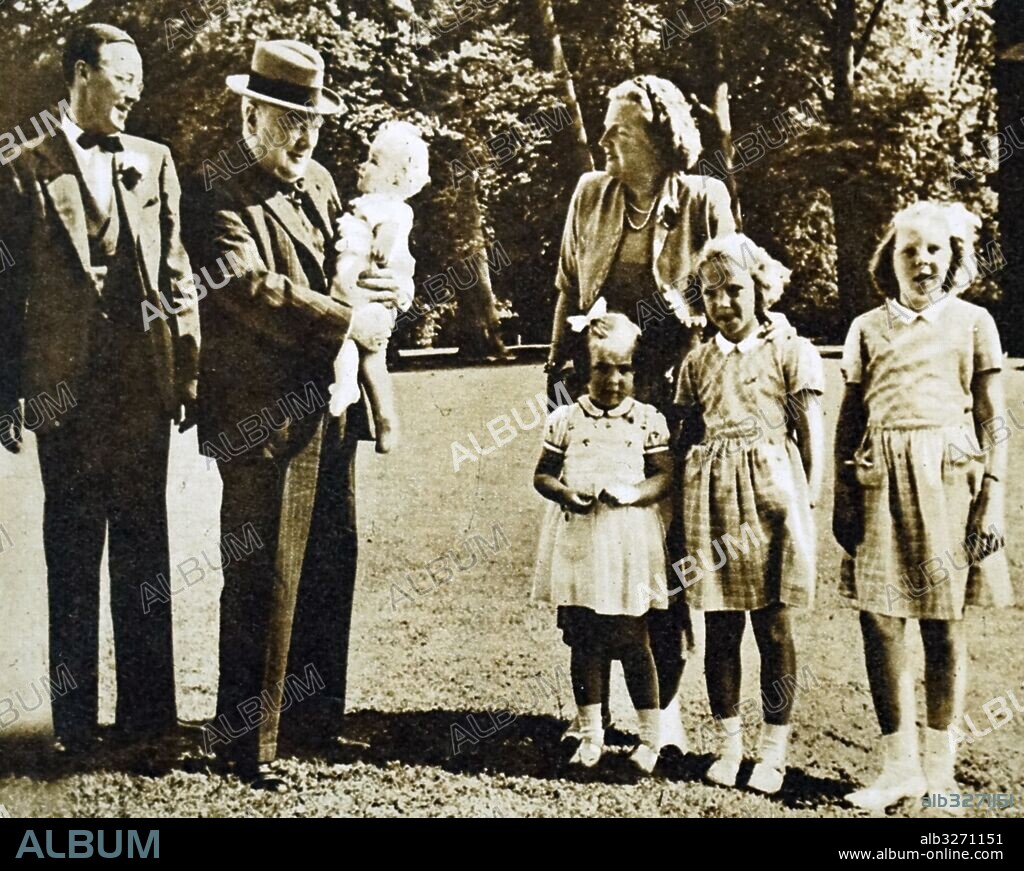 Photograph of Princess Juliana of the Netherlands (1909-2004), Sir Winston Churchill (1874-1965) and Prince Bernhard of Lippe-Biesterfeld (1911-2004) with their children. Dated 20th Century.