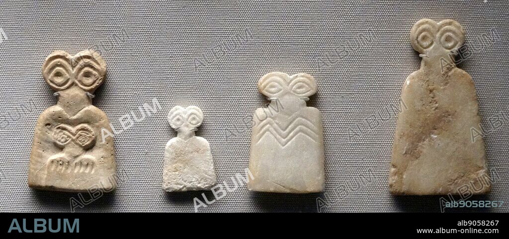 Sumerian stone head and eye figurines made of glazed faience and clay. From the Eye Temple, Tell Brak, Syria; during the Late Uruk period, 3300-3000 BC.