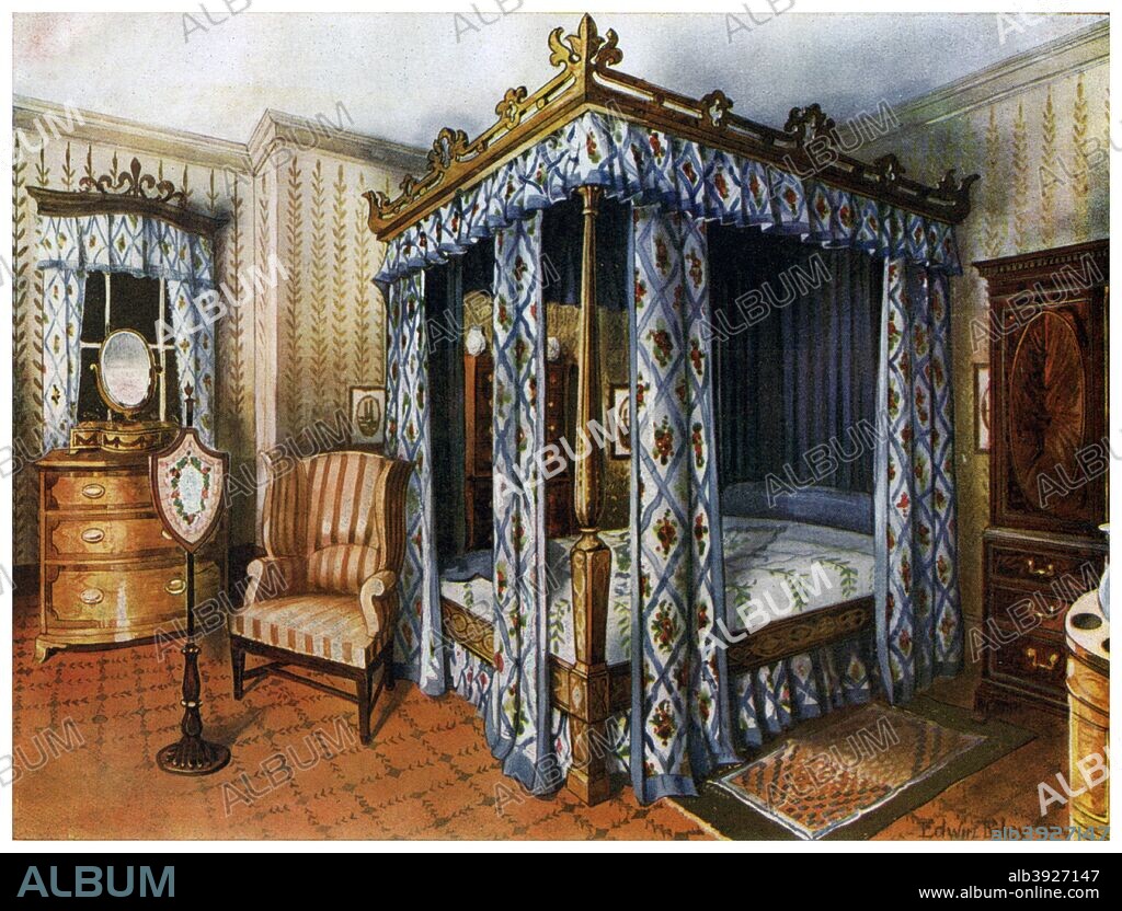A Hepplewhite bedroom, 1911-1912. Chintz curtained inlaid satinwood bed and inlaid satinwood dressing chest and mahogany wardrobe. A print from The Book of Decorative Furniture its Form, Colour and History, Volume II by Edwin Foley, TC and EC Jack Ltd, London, 1911-1912.