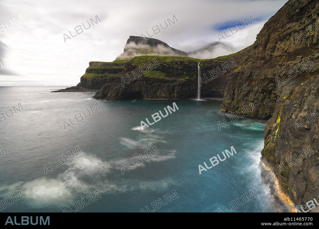 Waterfall of Gasadalur, Vagar island, Faroe Islands, Denmark, Europe.