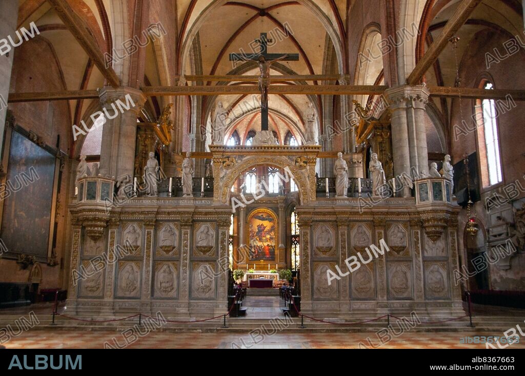 The Basilica di Santa Maria Gloriosa dei Frari, usually just called the Frari, is a church located in the Campo dei Frari at the heart of the San Polo district of Venice, Italy.<br/><br/>. In 1231, under Doge Jacopo Tiepolo, the city donated land at this site to establish a monastery and church belonging to the Franciscan Order of Friars Minor. This edifice proved too small and a three nave church was begun in 1250, and not completed until 1338. Work almost immediately began on its much larger replacement, the current church, which took over a century to build.
