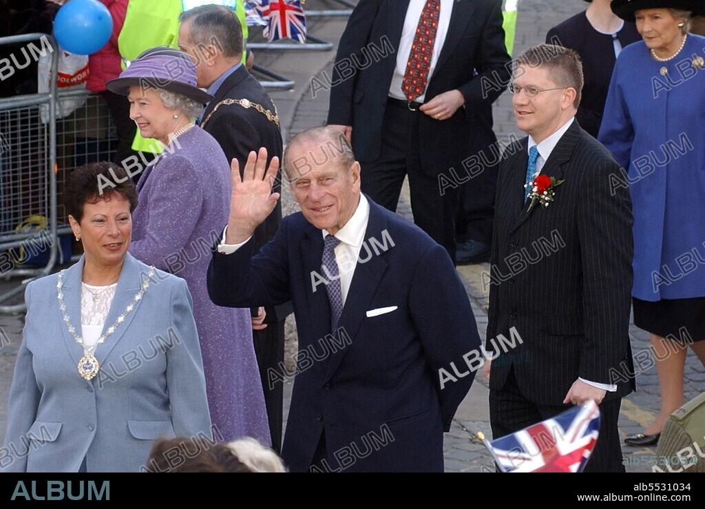 The Duke of Edinburgh, Prince Philip, joins Queen Elizabeth II during a visit to Romford in the London Borough of Havering. 06/03/2003.