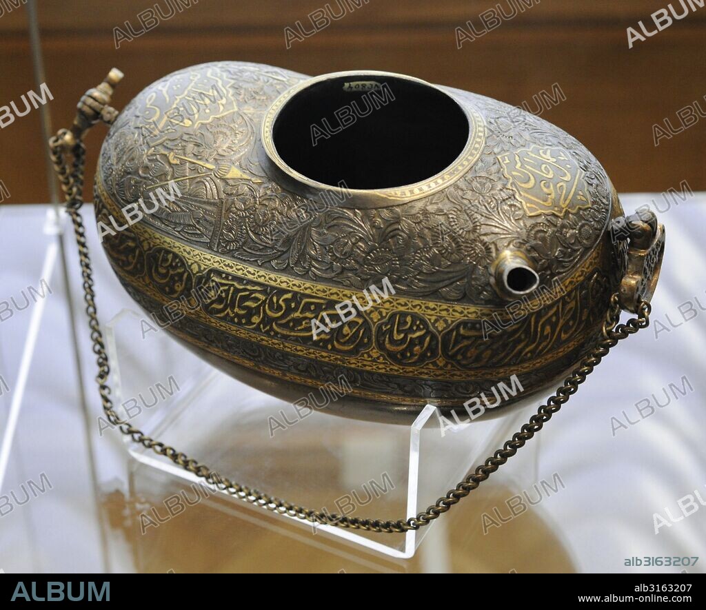 Islam. Near East. Persia. Kashkul (begging bowl for a Dervish). Steel; casting, carving, gilding. Iran, Late 19th- early 20th century. By Hajji 'Abbas (?). The State Hermitage Museum. Saint Petersburg. Russia.